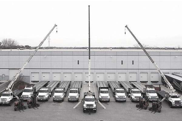 a fleet of Beacon trucks and cranes